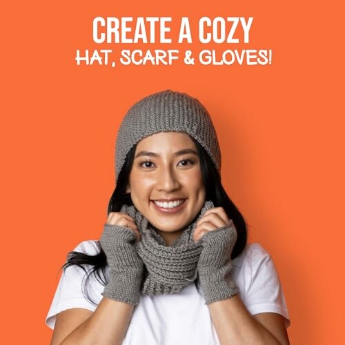 Person wearing knitted hat, scarf, and gloves on orange background.